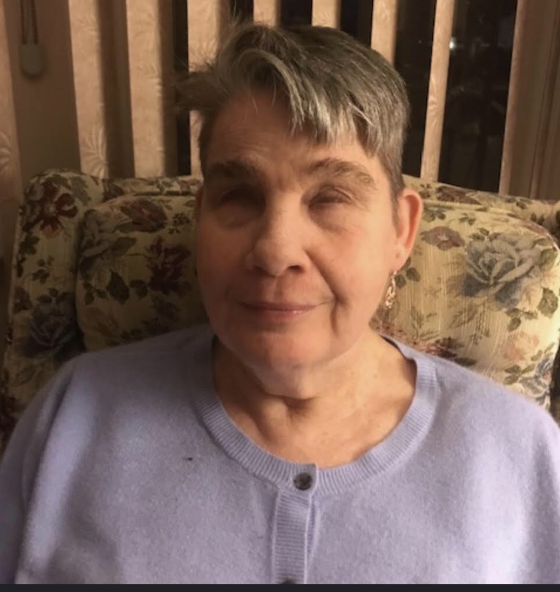 Photo of Mary Ellen smiling.